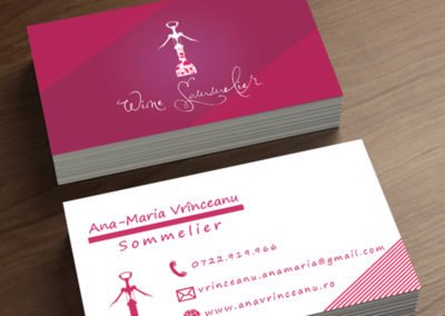 Wine sommelier business card that shows a wine bottle being opened.